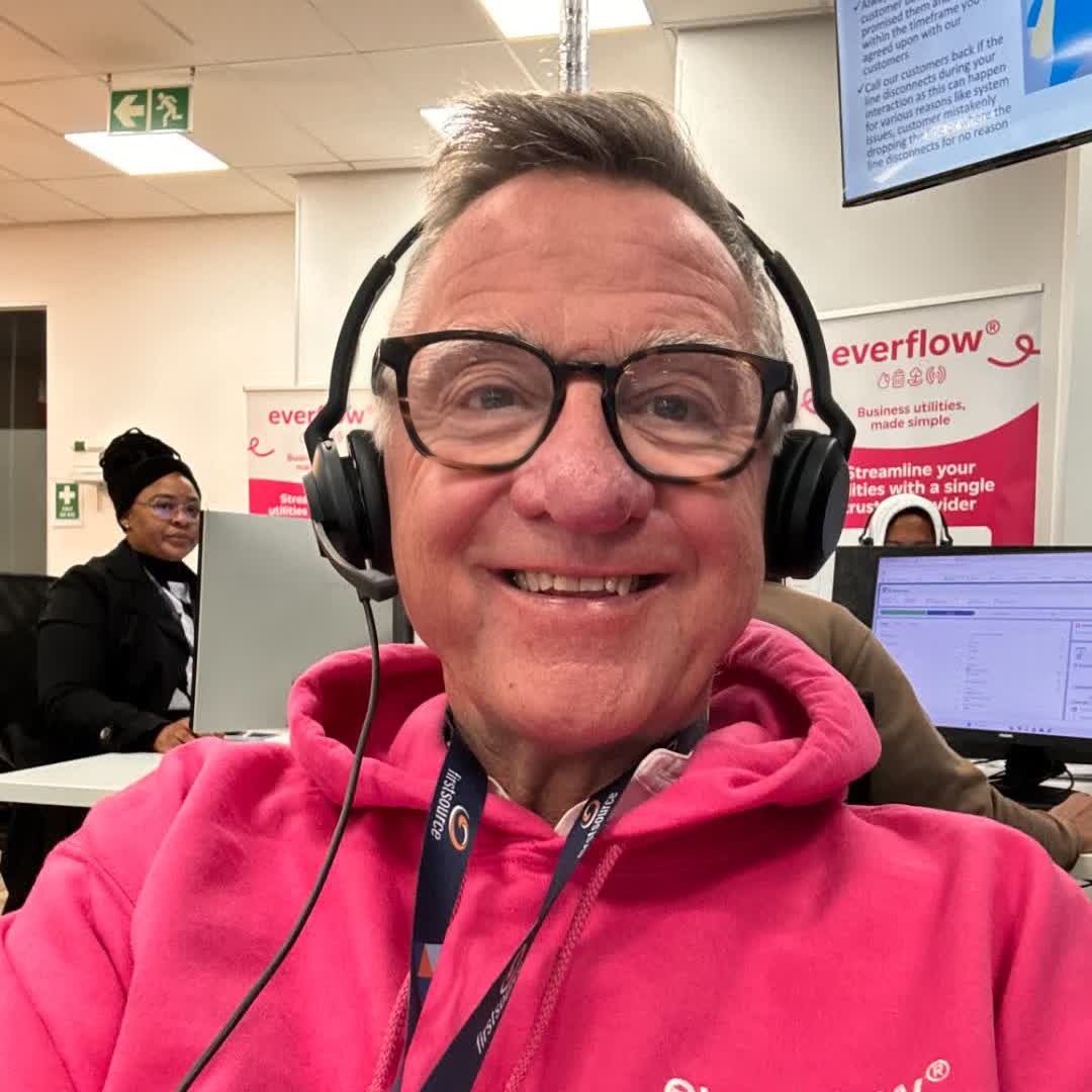 David Foggin wearing a headset on the contact-centre floor during the Everflow sales pilot in Cape Town